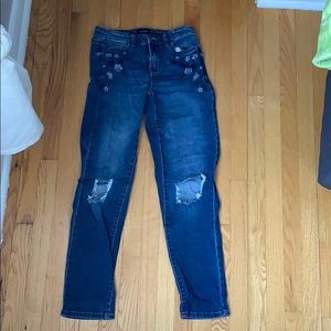 Blue jeans with embroidered flowers